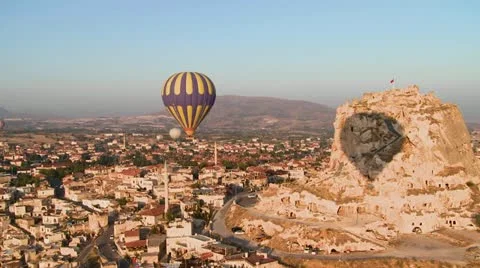 A high angle of hot air balloons flying over the ancient region of Cappadocia, Stock Footage