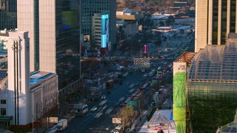 High angle hyperlapse zoom out of busy traffic on Sejong-daero road in Seoul at Stock Footage 328220292