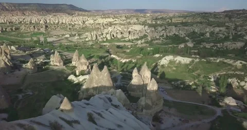 High Angle Landscape View of Rose Valley and Fairy Chimneys under Morning Sun Stock Footage 340259234