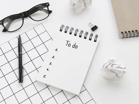 High angle list notepad with glasses pen Stock Photos