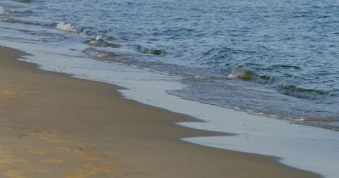 High angle lockdown shot of waves on shore at beach - Camargue, France Stock Footage 130143086