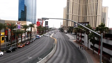 High angle long shot of traffic coming down the Las Vegas strip in the daytime Stock Footage 106621700