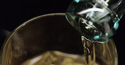 High angle, macro above shot of alcohol / liquor being poured Stock Footage 71780590