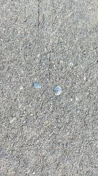 High Angle Macro Texture of Rough Grey Asphalt Surface Stock Photos