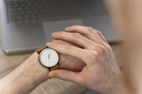 High angle man looking his watch Stock Photos