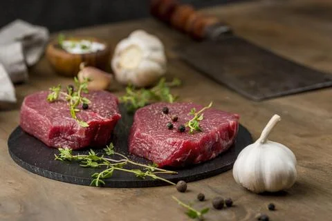 High angle meat with herbs garlic. High quality photo Stock Photos