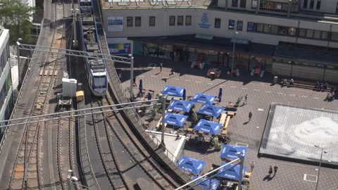 High angle of metro train leaving Den Haag Centraal station Vidéo 250841602