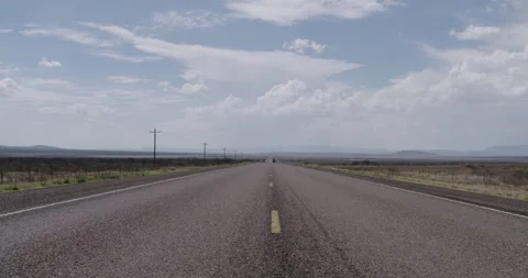 High Angle in the Middle of the Road - West Texas USA Stock Footage 256049728