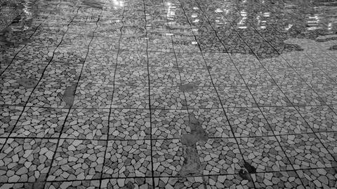 High angle monochrome perspective captures gentle ripples across a resort s.. Stock Photos