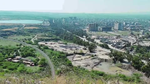 High angle mountain view showing urban sprawl and ant colony Stock Footage 333542719
