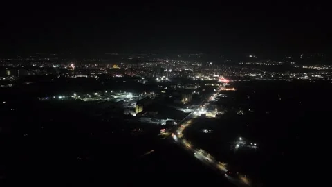 High angle night view of the urban landscape with highway traffic. Video stock 329185483