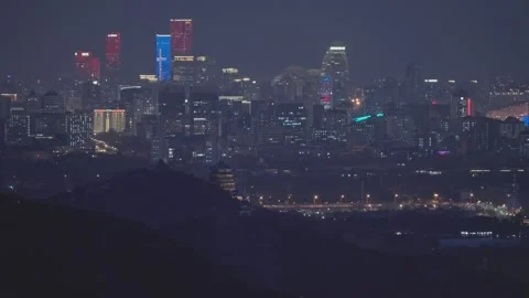 High Angle Nightscape of Beijing with Summer Palace and skyscrapers Stock Footage 336484361