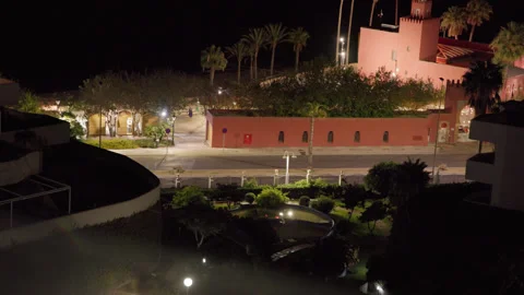 High Angle Nighttime Street With Multiple Cars Passing By Stock Footage 307702121