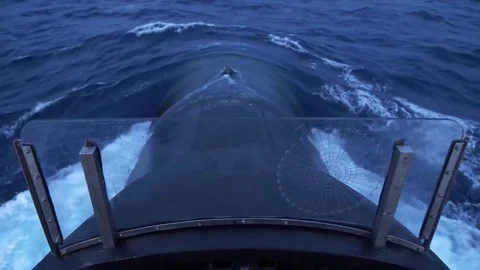 High angle of nuclear submarine bow entering the ocean Stock Footage 82537383