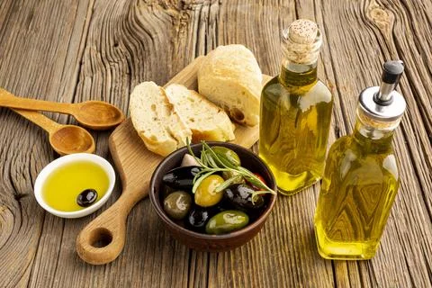 High angle olives mix bread oil bottles Resolution and high quality beautiful Stock Photos