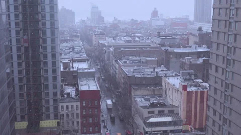 High angle over Manhattan New York with heavy rain falling. Stock Footage