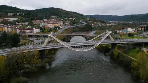 High angle overview of Millennium Bridge Miño River in Ourense, Galicia, Stock Footage 259616895