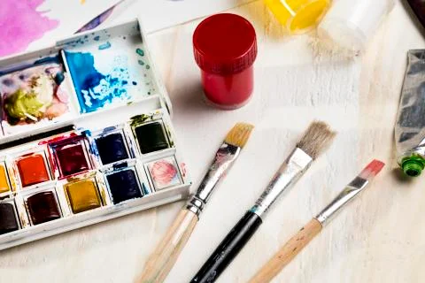 High angle of paint brushes and palette Photo Stock Photos