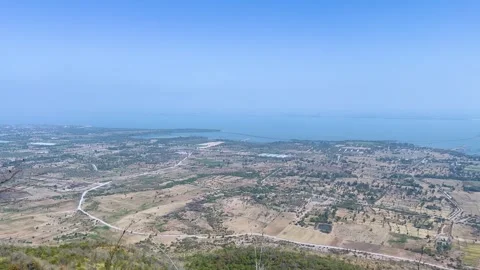 High Angle Pan Over Lopburi Mountain Valley and Reservoir Video stock 323777542