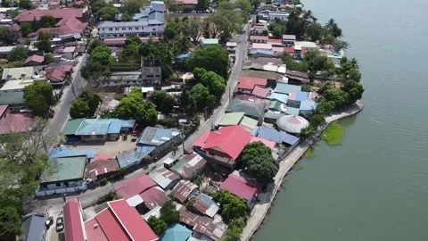 High Angle Pan of San Rafael, Bulacan Urban and Nature Contrast Stock Footage 319510329