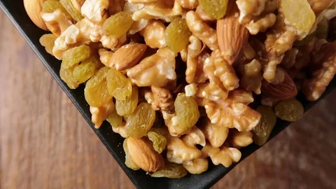 High angle panning shot of dry fruits plate. Stock-Footage 121707431