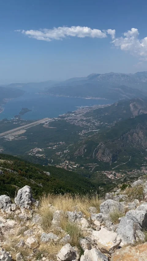 High-angle panorama of the Bay of Kotor and Tivat Airport in Montenegro Vídeos de archivo 343790995