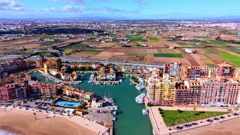 High angle panorama of luxury harbor and farm land Stock-Footage 334860541