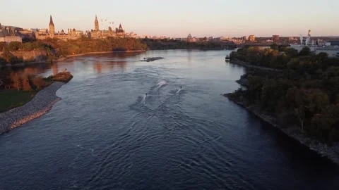 High-angle panoramic aerial drone perspective looking east down the Ottawa R Stock-Footage 347532887