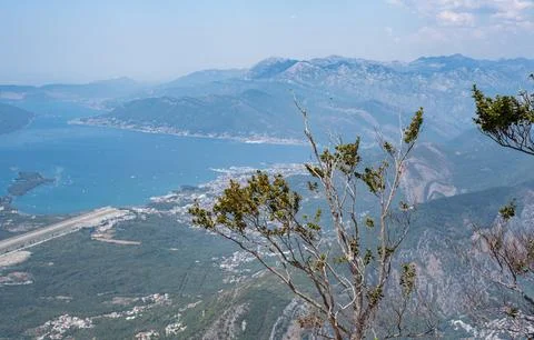 High-angle panoramic view of the Bay of Kotor and Tivat Airport Stock Photos
