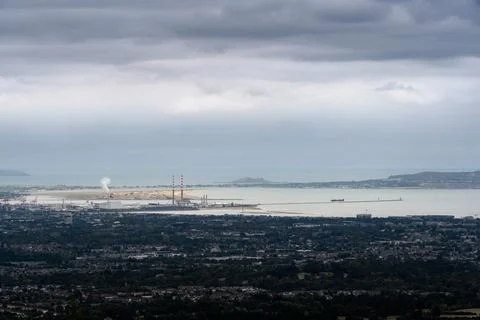 High angle panoramic view of Dublin city skyline Dublin Bay Poolbeg chimneys and Stock Photos