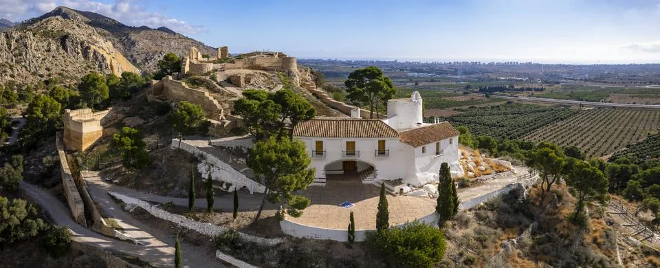 High angle panoramic view of Hermitage of La Magdalena and Old Castle ruins on Stock Photos