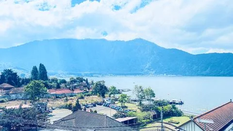 High Angle Panoramic View of Lake Bratan surrounded by Mountains Stock Photos