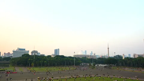 High angle panoramic view of locals socializing in Merdeka Square Jakarta Stock Footage 347173703