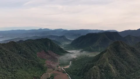 High angle panoramic view of the majestic hills and a misty valley Stock Footage 346012229