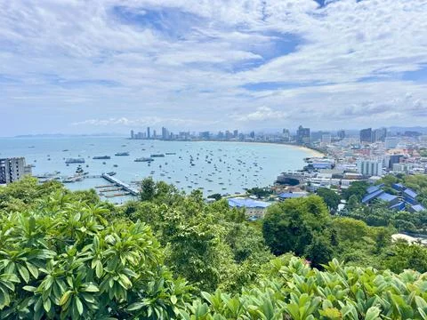 High angle panoramic view of Pattaya City and crescent moon bay with many Stock Photos
