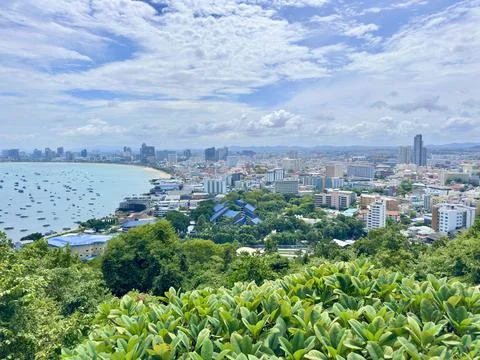 High angle panoramic view of Pattaya City and crescent moon bay with many Stock Photos