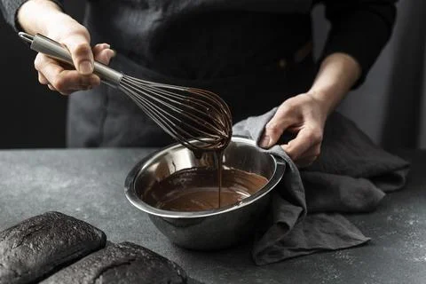 High angle pastry chef preparing chocolate cake Stock Photos