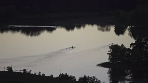 High Angle of People Rowing Across a Lake in Canberra, Australia at Sunrise Stock-Footage 302943397