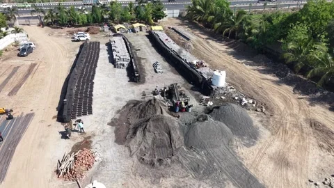 High Angle Perspective of Busy Industrial Construction Zone with Workers and Stock Footage 340418967