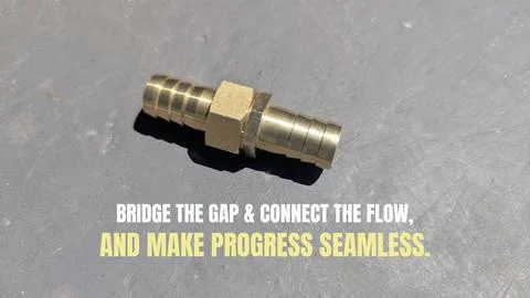 A high angle perspective displays a solid brass hose barb coupler fitting s.. Stock Photos