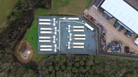 High angle perspective of an electrical utility yard and mega battery storage Stock Footage 336711130