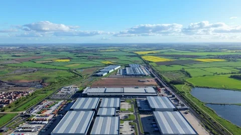 High angle perspective of modern fulfillment centers, loading docks, and Stockbeeldmateriaal 345207250