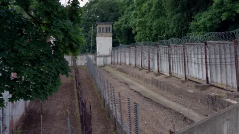 High angle perspective of security corridor with guard tower inside Daugavpils Stock Footage 344355179