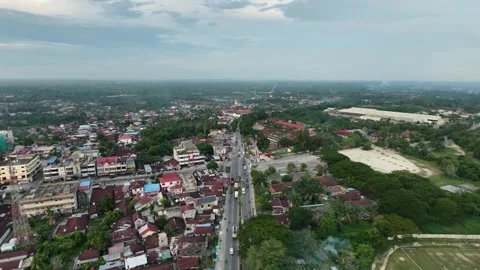 High-angle perspective tracking along a central road Stock Footage 347846245