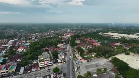 High-angle perspective tracking along a central road Stock Footage 347846266