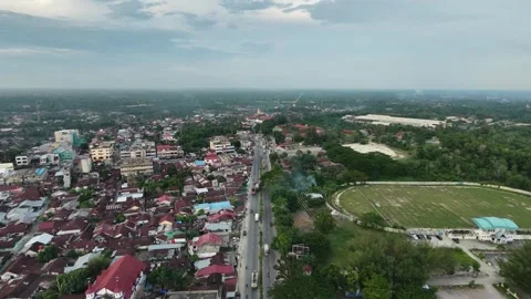 High-angle perspective tracking along a central road Stock Footage 347846300