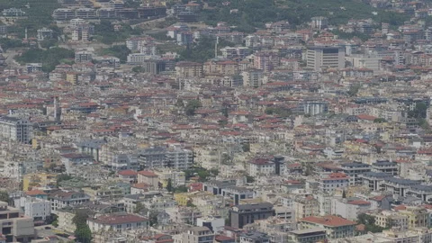 High angle perspective of a vast, densely populated city, showing a sprawling Stock Footage 345875185