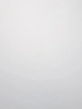 High angle picture vertically against the foggy morning sky. Simple white. Stock Photos
