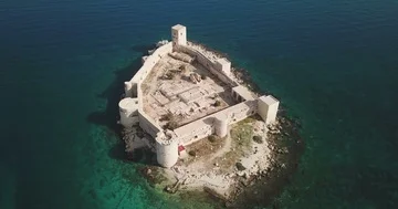 High Angle POI CCW Aerial Pan Around Kizkalesi Castle Island Ocean Turkey 4K Stock Footage 85529844