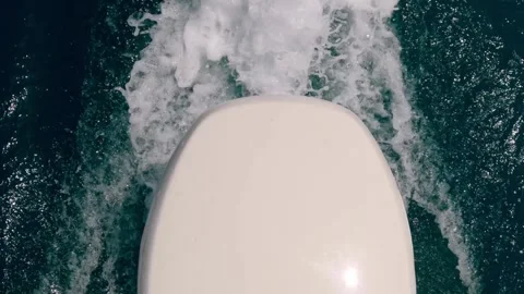 High angle pov of motorboat engine leaving sea water wake Vidéo 279860717